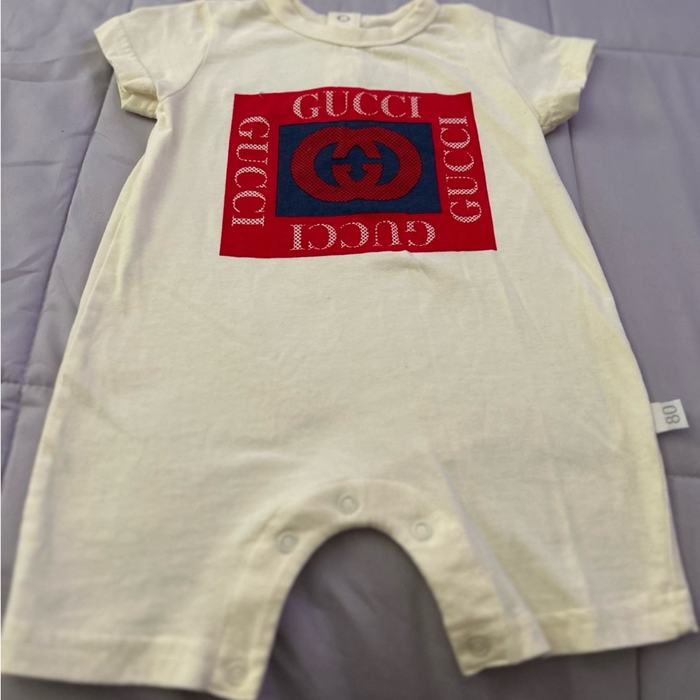 Gucci Infant Cream Onesie with Red and Blue Accents